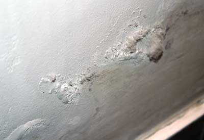 Salts bursting through wall paint