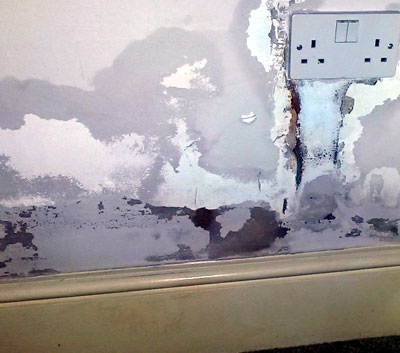 Damp repaired with plaster and filler - not a proper fix.